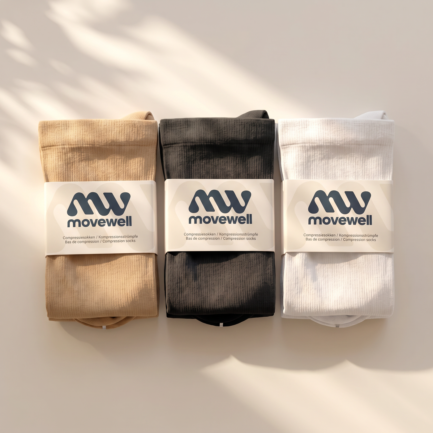 MoveWell compressiekousen verpakking in zwart, huidskleur en wit